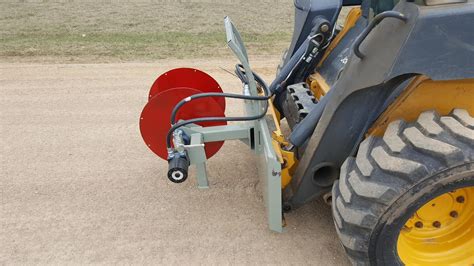 wire winder skid steer attachments